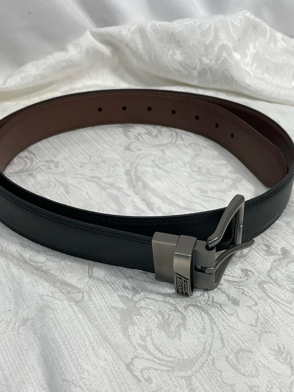 Dickies Black Leather Belt with Silver Tone Metal Buckle.